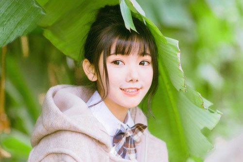女生扎最美丸子头塑造迷人风范 支撑多个场合佳人款梳扎发系
