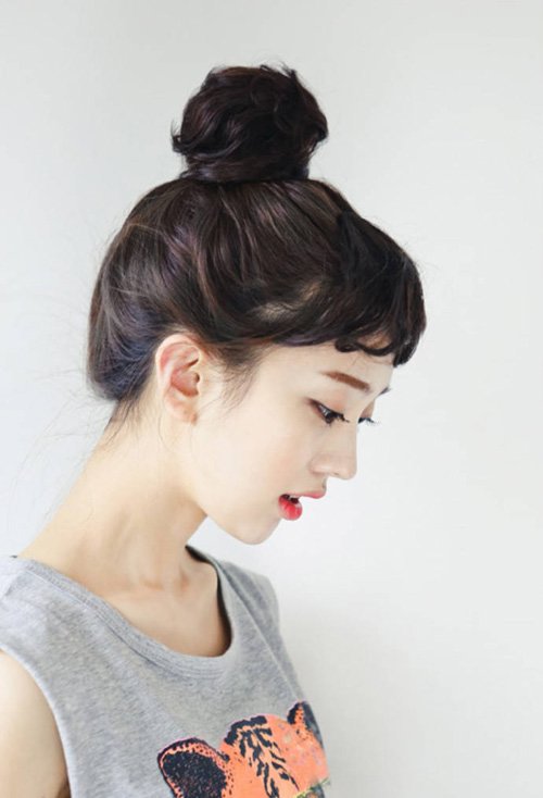 女生扎最美丸子头塑造迷人风范 支撑多个场合佳人款梳扎发系